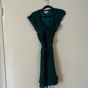 Wrap dress, flowy, emerald green animal print with blue and black undertones.